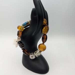 Beaded bracelet w/ elephant charm